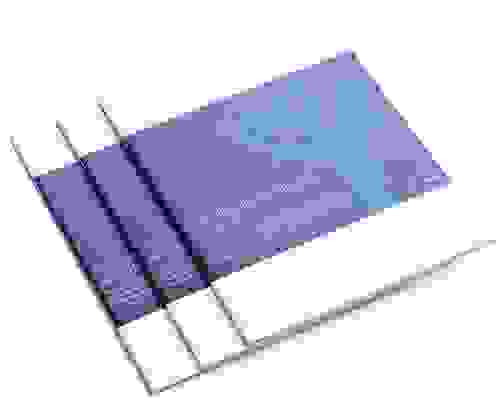 Three stacked books with purple cover and electric circuits